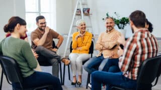 Smiling group of people of different ages